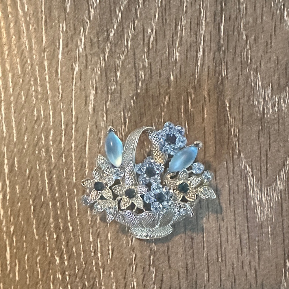 Elegant Silver and Blue Floral Brooch